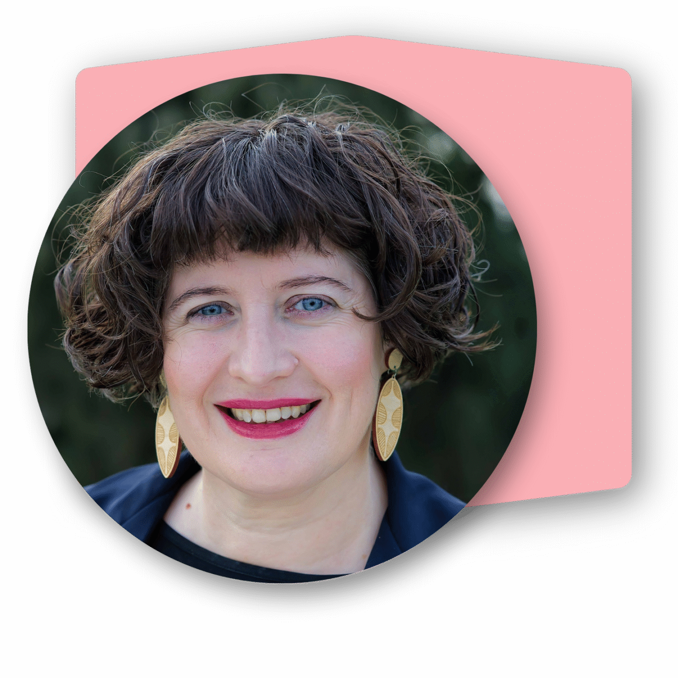 Profile picture of Catherine, a white woman with short, dark curly hair wearing gold dangling earrings and red lipstick.