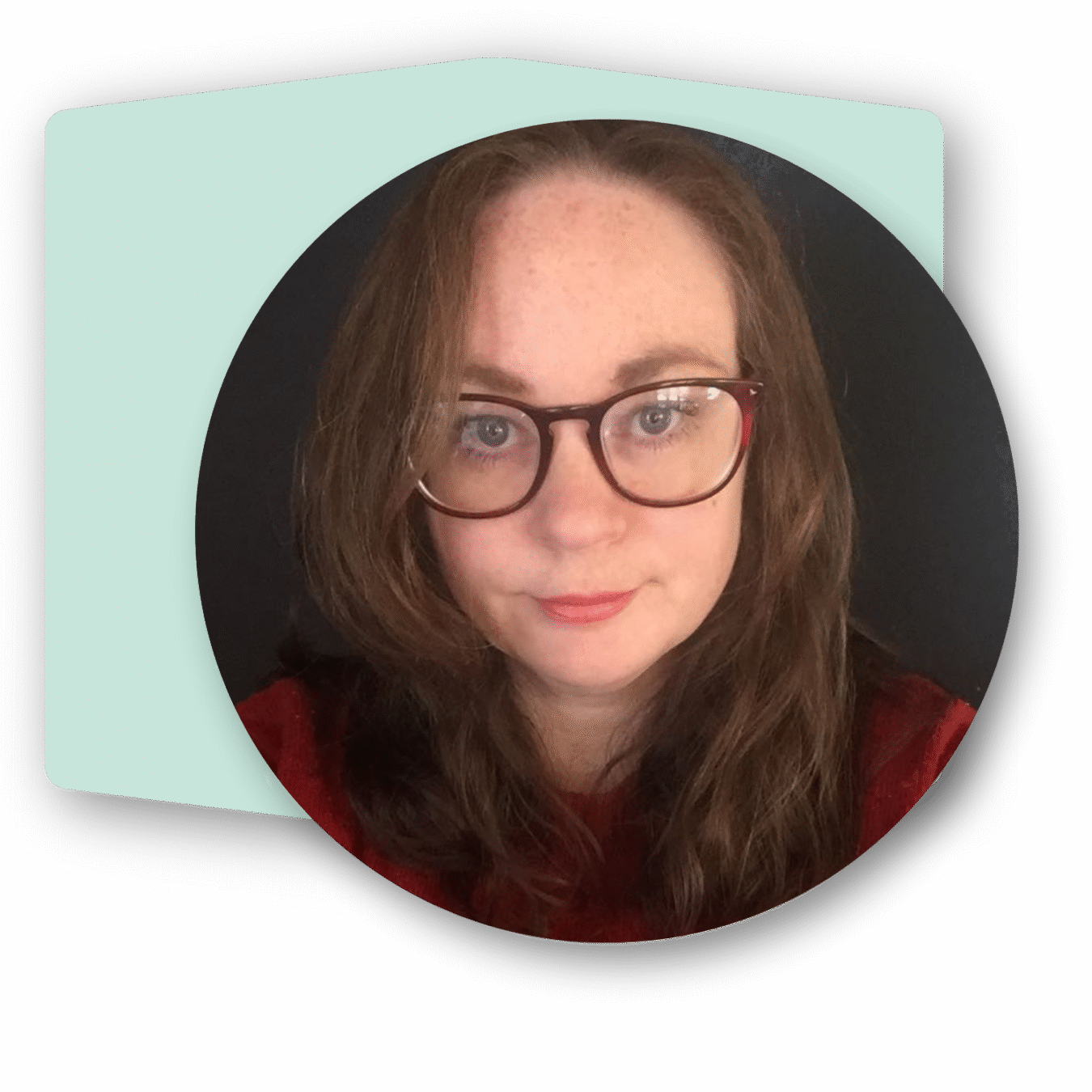 Profile picture of Naomi, a white woman with long dark hair wearing red glasses. Behind the photo is a green hexagon.